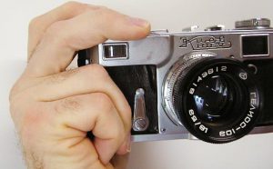 This is called "The Contax Grip". Make sure you do not block the rangefinder window!