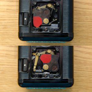 This is the Argus 75's shutter. The top picture is uncocked, and the bottom is cocked. Notice the red painted piece of the shutter blade which moves into position where the taking lens would be.