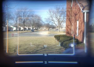This image shows the large and bright size of the viewfinder along with it's multiple framelines for different focal length lenses.