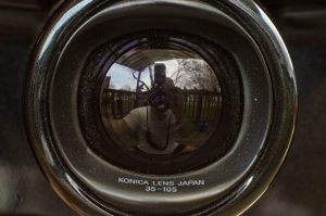 The built in lens cap is semi-transparent when the camera is off, but when switched on, automatically rotates back into the camera.