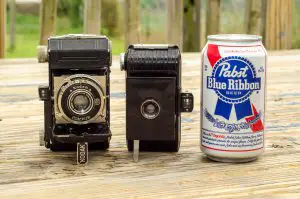 The Bantam is small. Compared to the Kodak Retina I which was considered to be a 'miniature' camera in it's day, and a can of Wisconsin's finest.