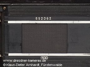 This camera features a special serial number engraving, where the usual prefixed framed VX is engraved below the lower film guide. This camera features a special serial number engraving, where the usual prefixed framed VX is engraved below the lower film guide.