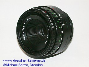 Pentaflex Color 2.8/50 (M42 Automatic), a variant of the Meyer Domiplan 2.8/50; shown here with a green feet scale and black setting rings.